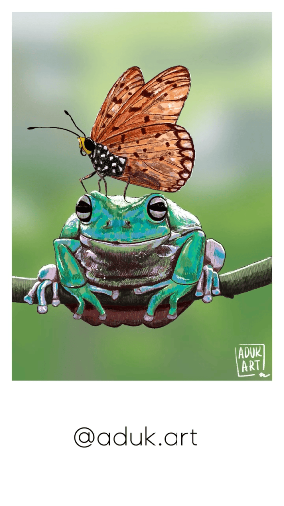 Reference image of a green frog sitting on a branch with an orange butterfly resting on its head.